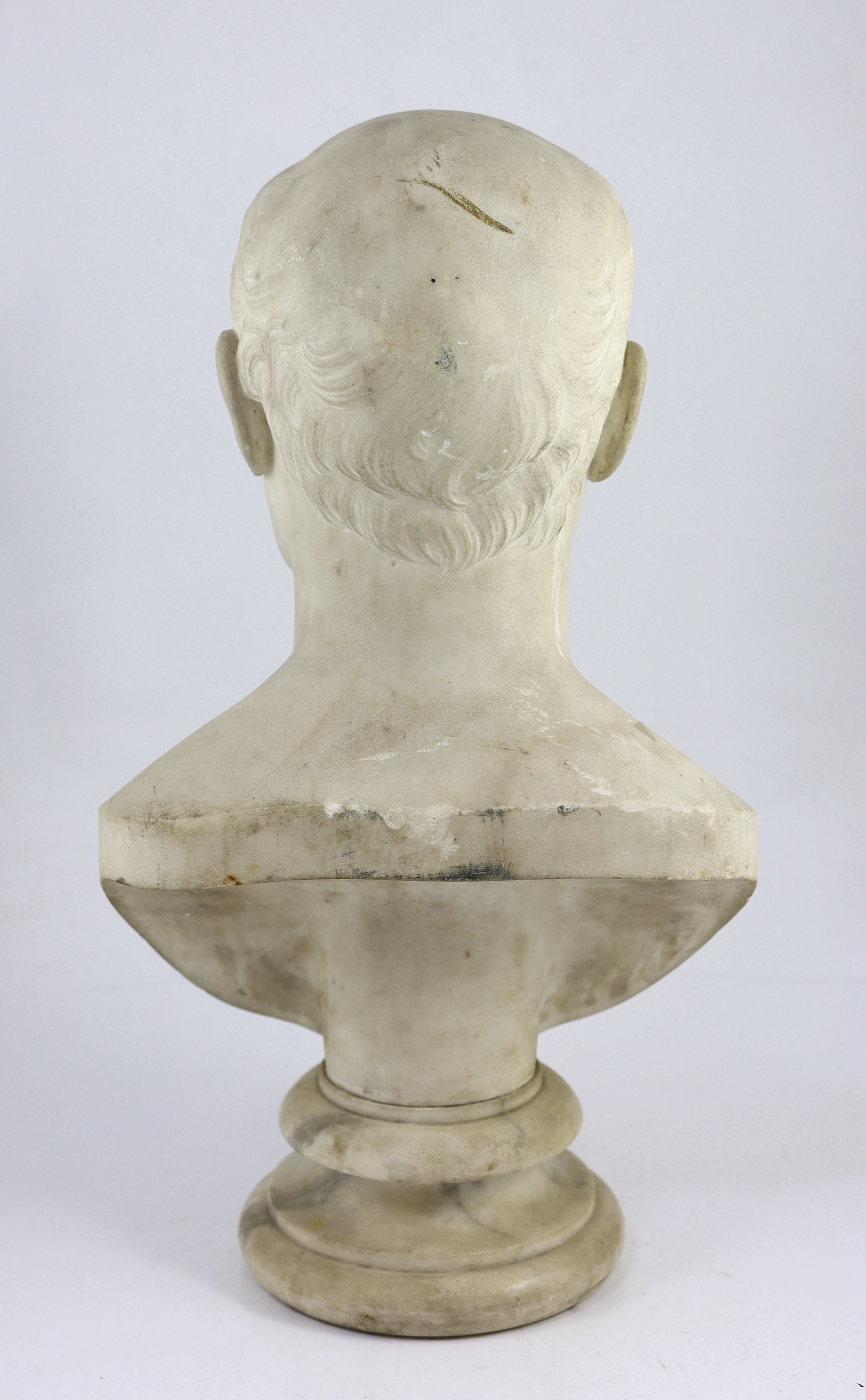 A carved white marble bust of a gentleman, second quarter 19th century, 30cm wide, 54cm high